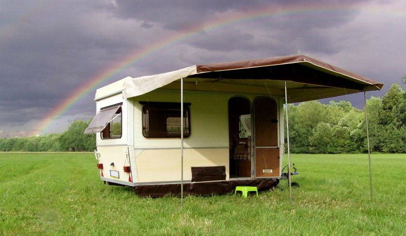 mit Sonnendach und Regenbogen